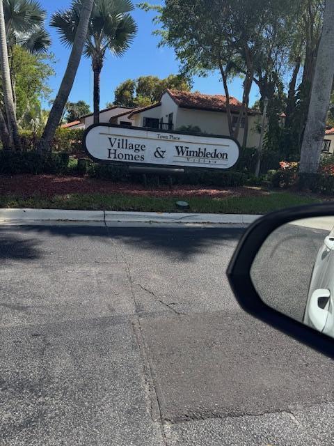 5544 Fox Hollow Drive Boca Raton, FL 33486 - Photo 20 of 22 a view of a street with a park