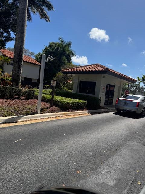 5544 Fox Hollow Drive Boca Raton, FL 33486 - Photo 21 of 22 a view of street with parked cars