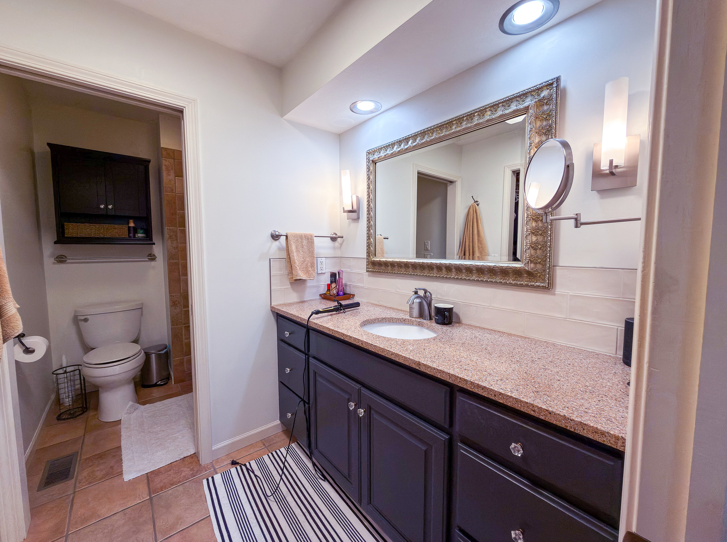 2902 Greystone Place Champaign, IL 61822 - Photo 19 of 35 a en suite bathroom with a toilet sink and mirror