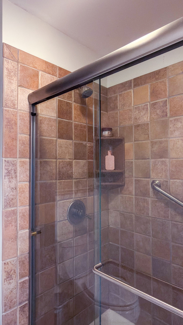 2902 Greystone Place Champaign, IL 61822 - Photo 25 of 35 a bathroom with a shower
