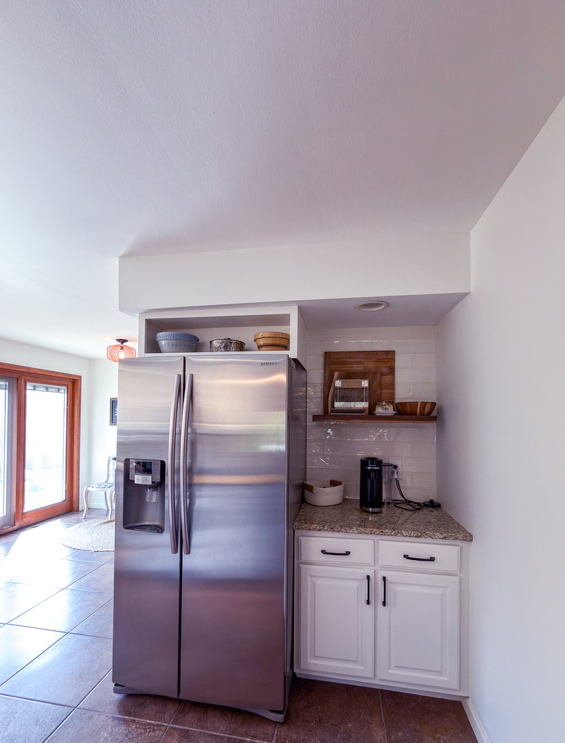 2902 Greystone Place Champaign, IL 61822 - Photo 10 of 35 a kitchen with stainless steel appliances a stove and a refrigerator
