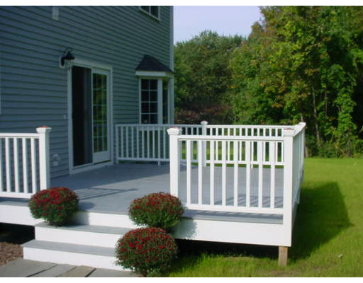 240 Gleasondale Road Stow, MA 01775 - Photo 13 of 13 a view of a chair and table and chair in the garden