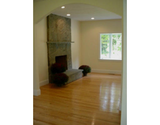 240 Gleasondale Road Stow, MA 01775 - Photo 5 of 13 a bed room with a bed and a fireplace