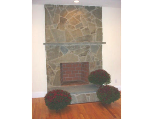 240 Gleasondale Road Stow, MA 01775 - Photo 6 of 13 a living room with furniture and a fireplace
