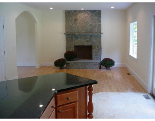 240 Gleasondale Road Stow, MA 01775 - Photo 9 of 13 a living room with furniture and a fireplace