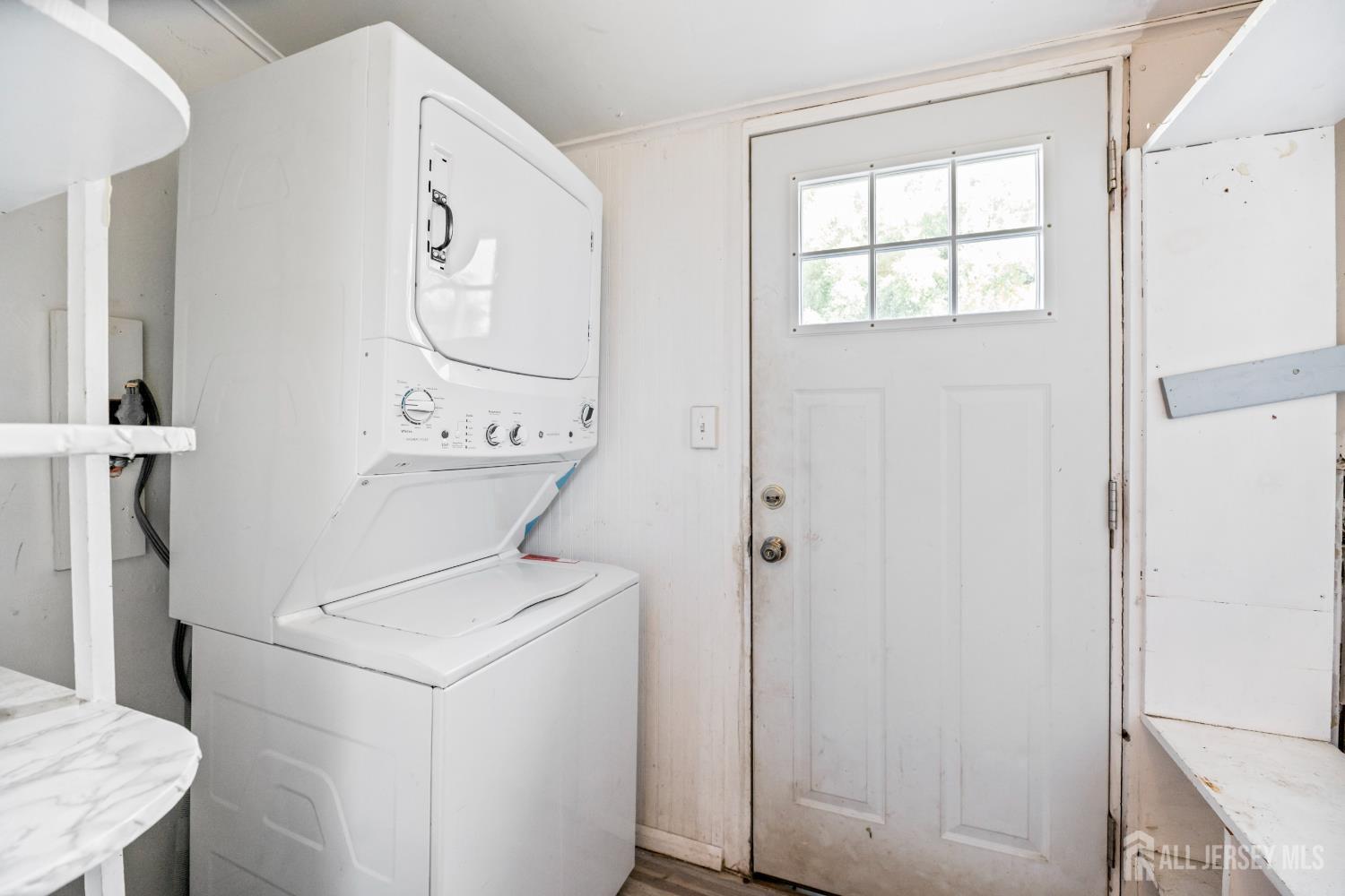 45 Loring Avenue Edison, NJ 08817 - Photo 18 of 23 a utility room with dryer and washer