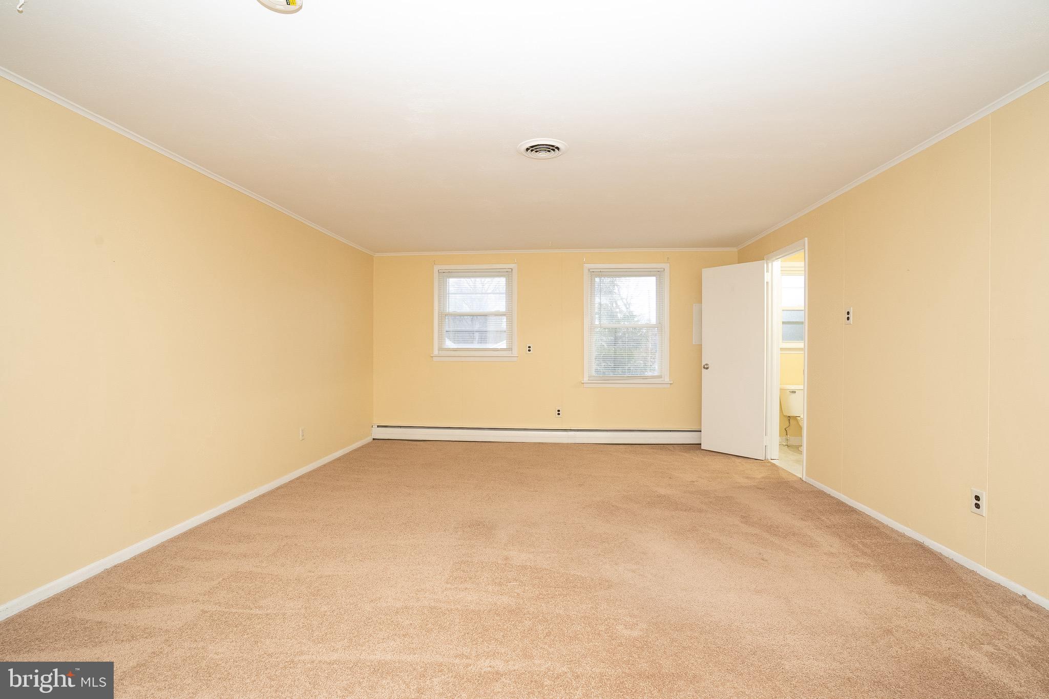 15 Cranbury Road, Unit 1 Princeton Junction, NJ 08550 - Photo 13 of 18 a view of an empty room with a window