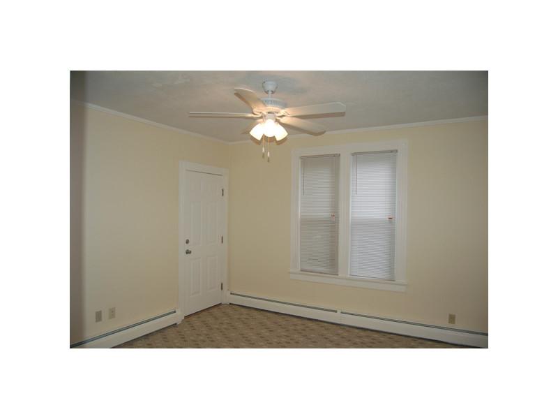 185 Church Street Woonsocket, RI 02895 - Photo 4 of 6 Living Room. Bright Cheery living room