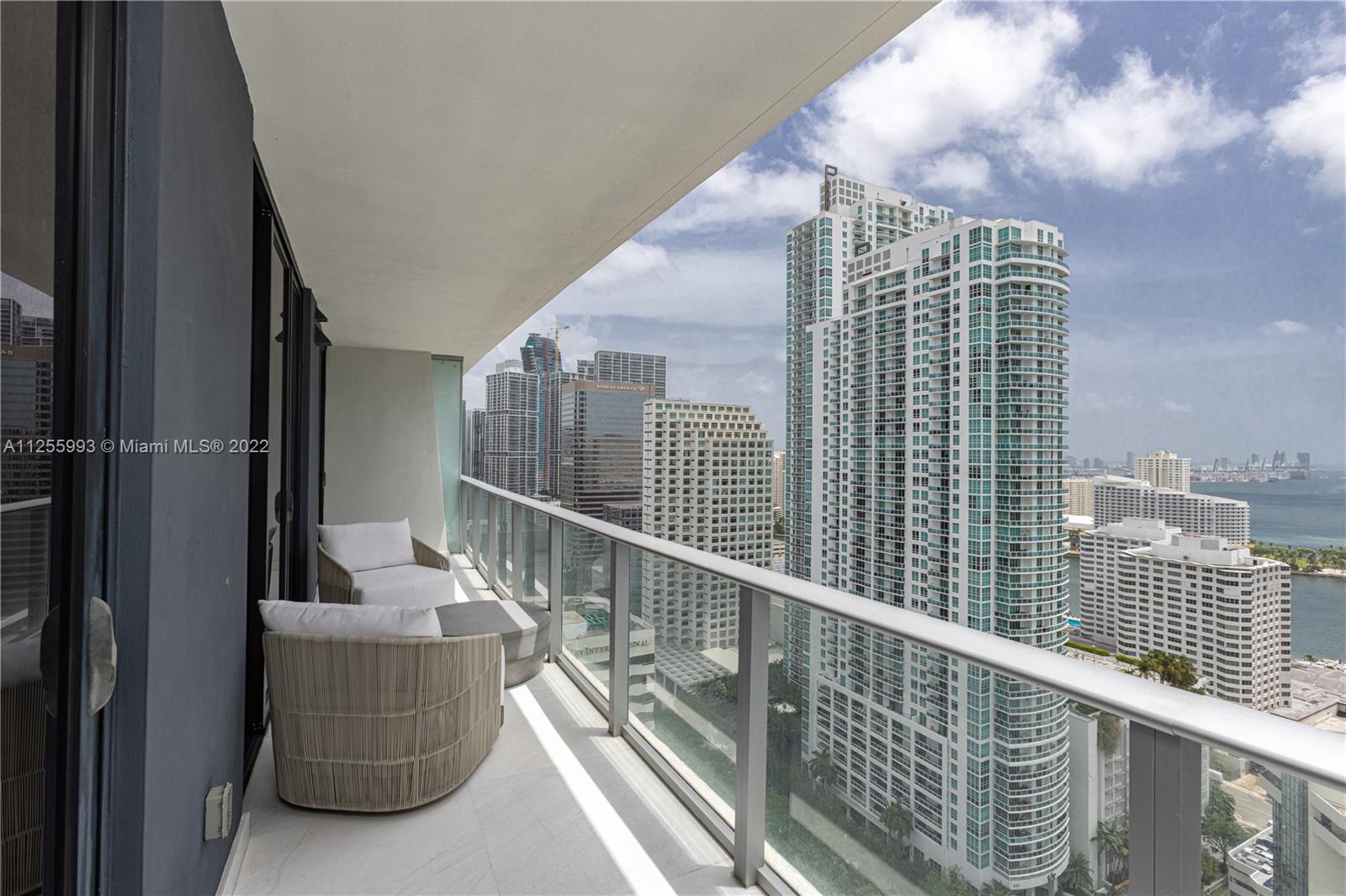 1010 Brickell Avenue, Unit 3003 Miami, FL 33131 - Photo 22 of 32 a view of balcony with glass door and outdoor view