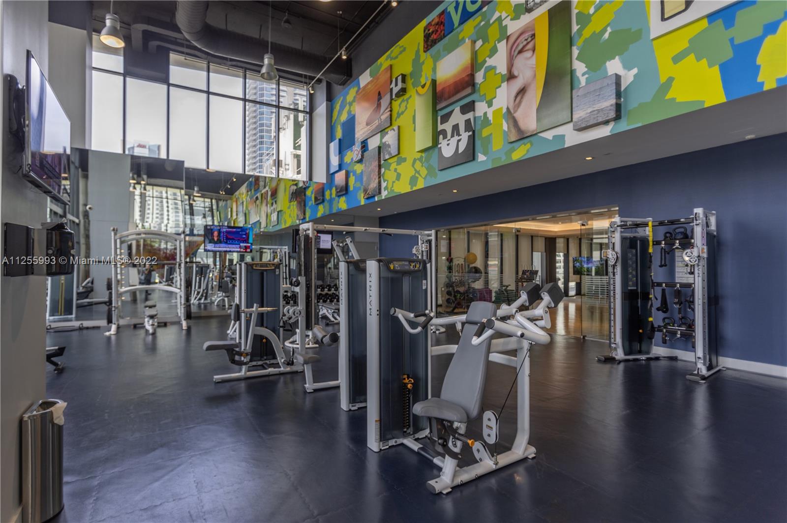 1010 Brickell Avenue, Unit 3003 Miami, FL 33131 - Photo 27 of 32 a view of a room with gym equipment
