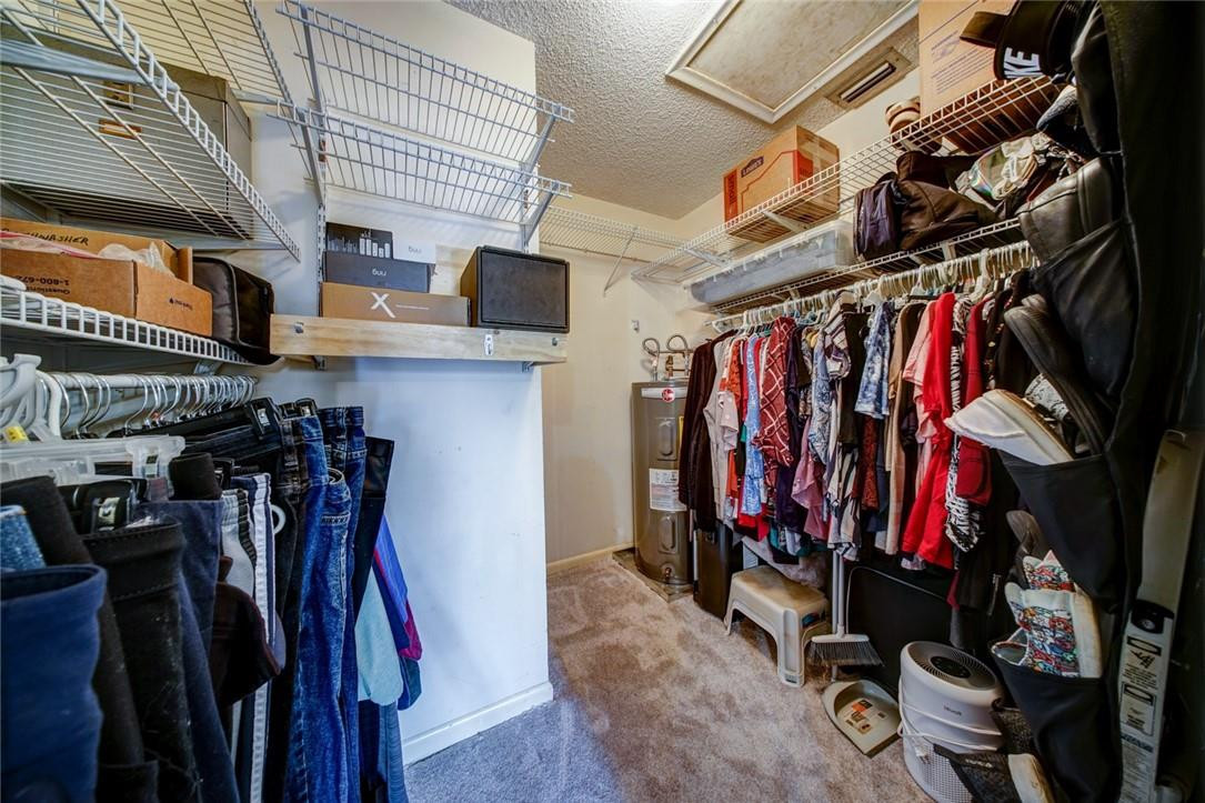 657 Banks Road, Unit 657 Margate, FL 33063 - Photo 25 of 38 Master bedroom walk in closet