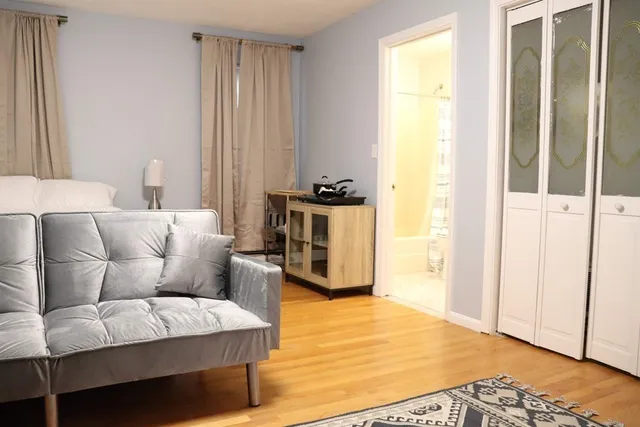 a room with furniture and a window