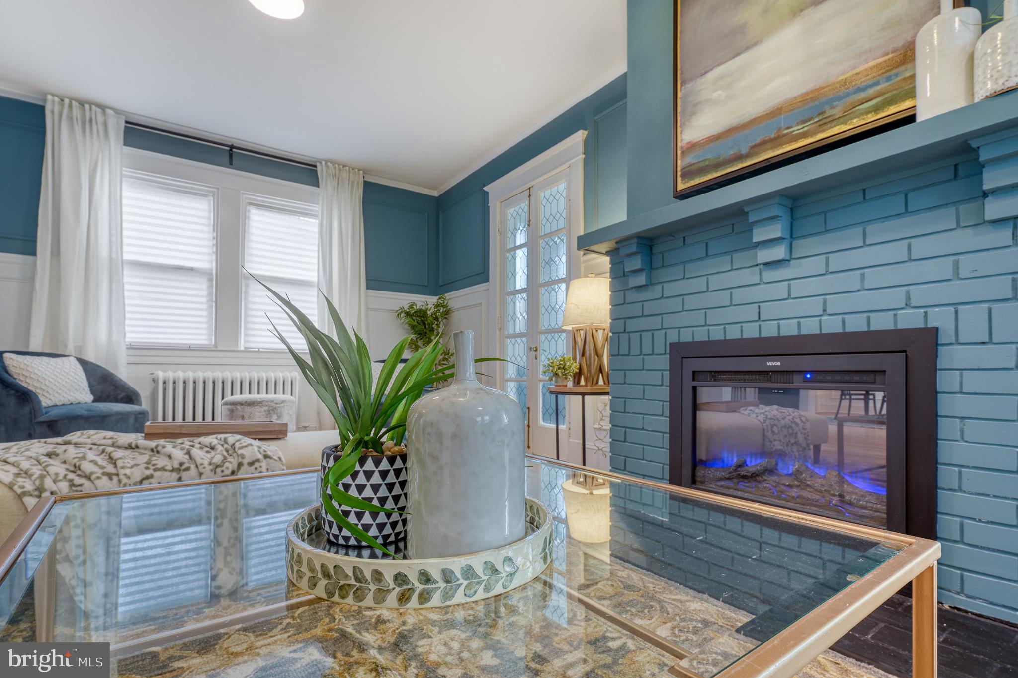 606 Aldershot Road Baltimore, MD 21229 - Photo 18 of 52 a vase of flowers sitting on a table