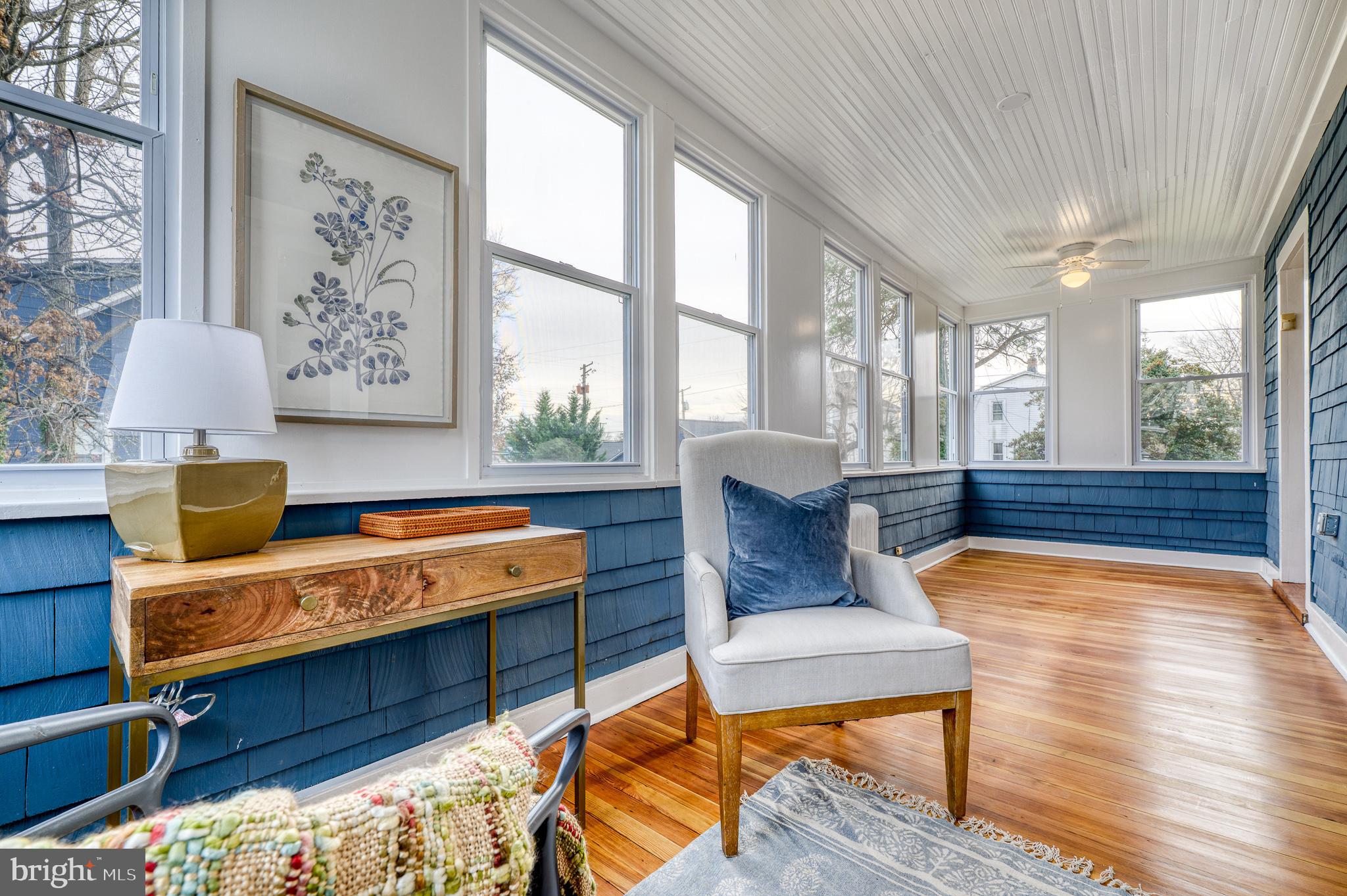 606 Aldershot Road Baltimore, MD 21229 - Photo 38 of 52 a living room with furniture and wooden floor