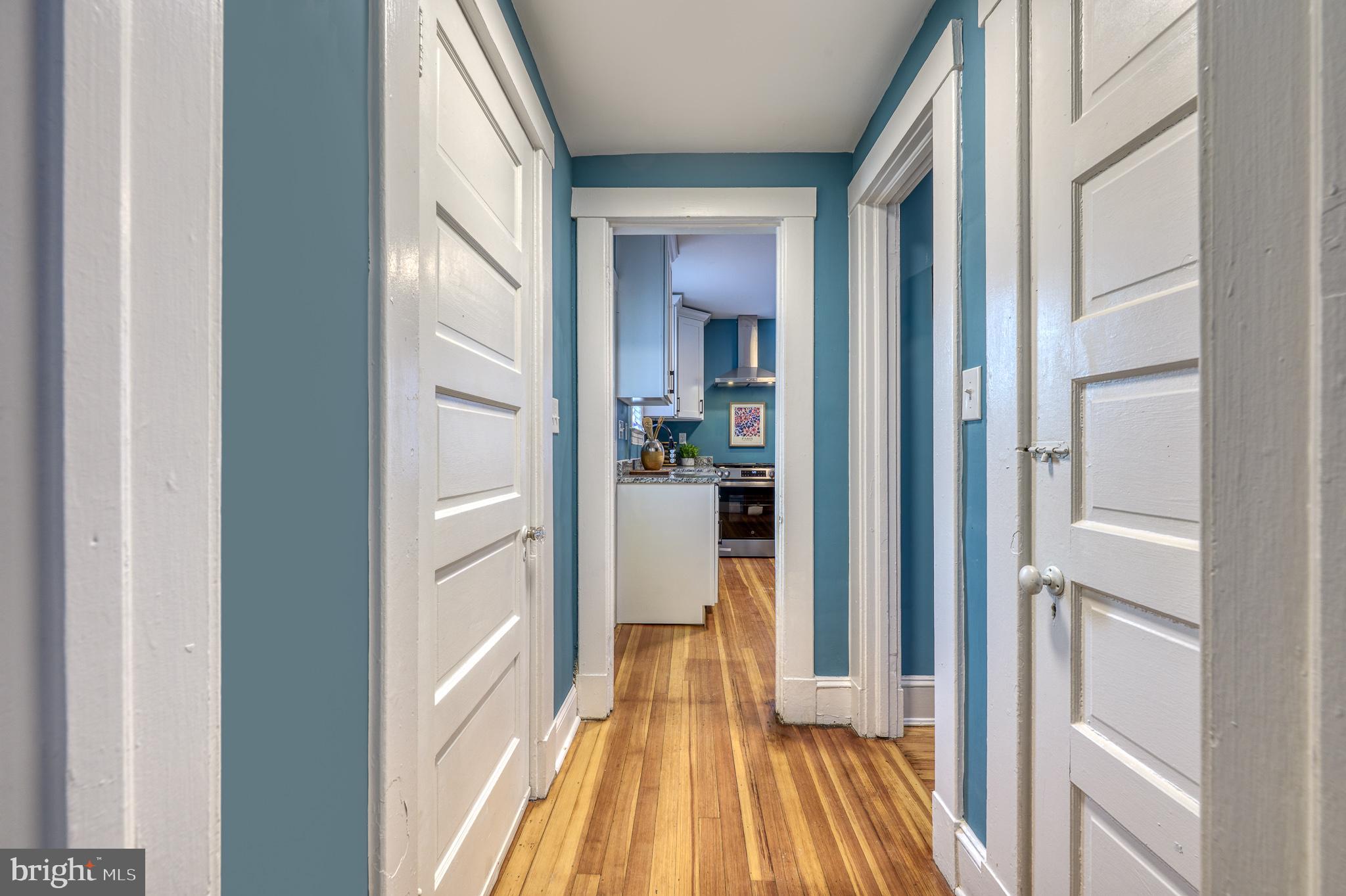 606 Aldershot Road Baltimore, MD 21229 - Photo 4 of 52 a view of a bedroom from a hallway