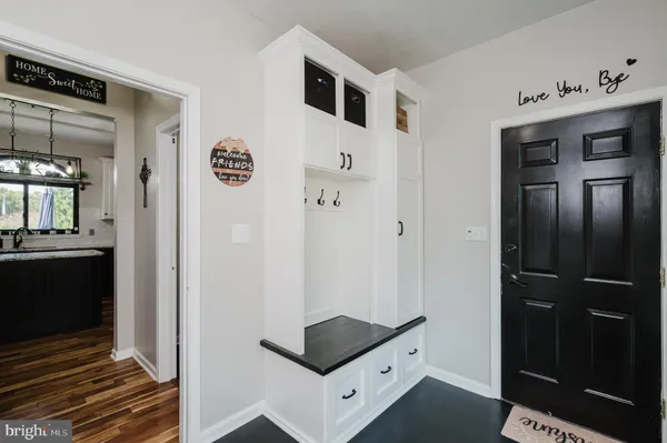 a view of a bathroom from the hallway