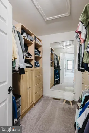 a view of a swimming pool with a yard