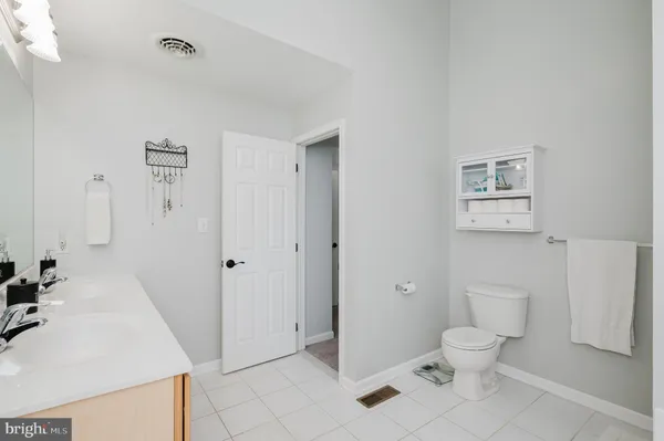 a view of a swimming pool with a lounge chairs