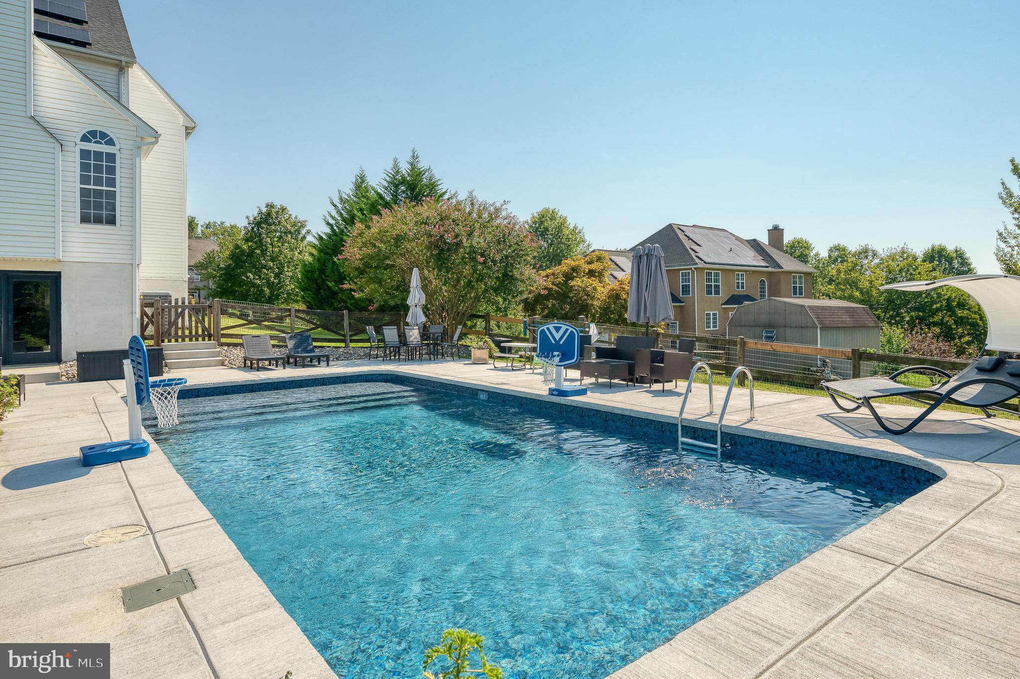 35 South View Road Rising Sun, MD 21911 - Photo 76 of 92 a view of a swimming pool with a lounge chairs