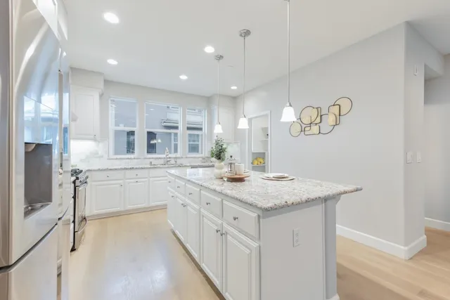 a bathroom with a sink a vanity and mirror