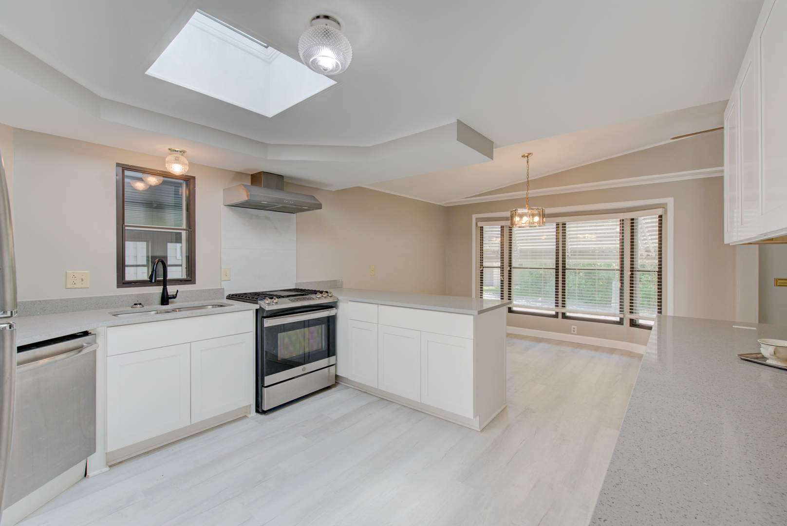 225 Melbrooke Road Elgin, IL 60123 - Photo 8 of 30 a kitchen with a stove and a sink
