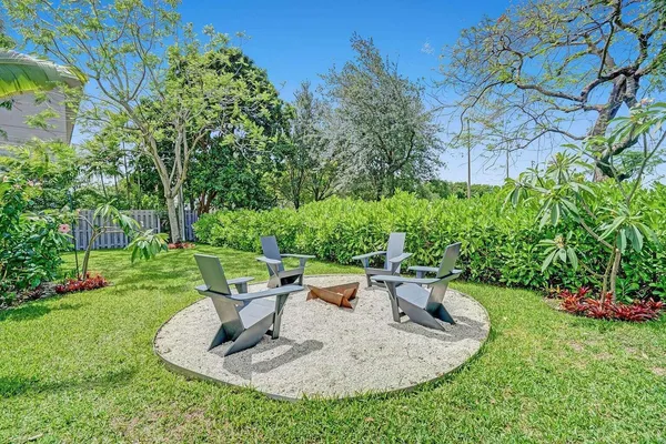 a view of a chair in a garden