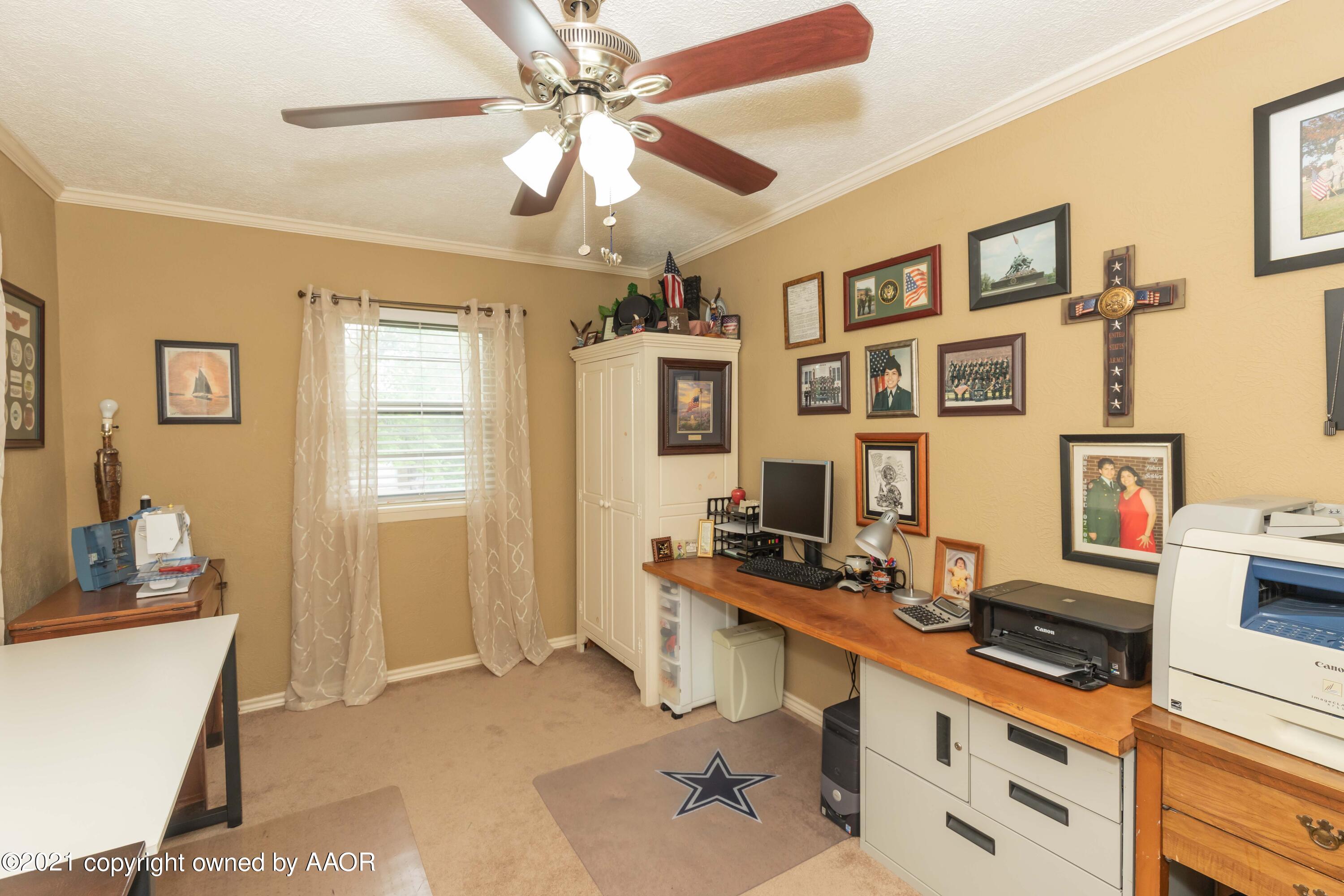 4707 Journey Street Amarillo, TX 79110 - Photo 43 of 65 a workspace with furniture and ceiling fan