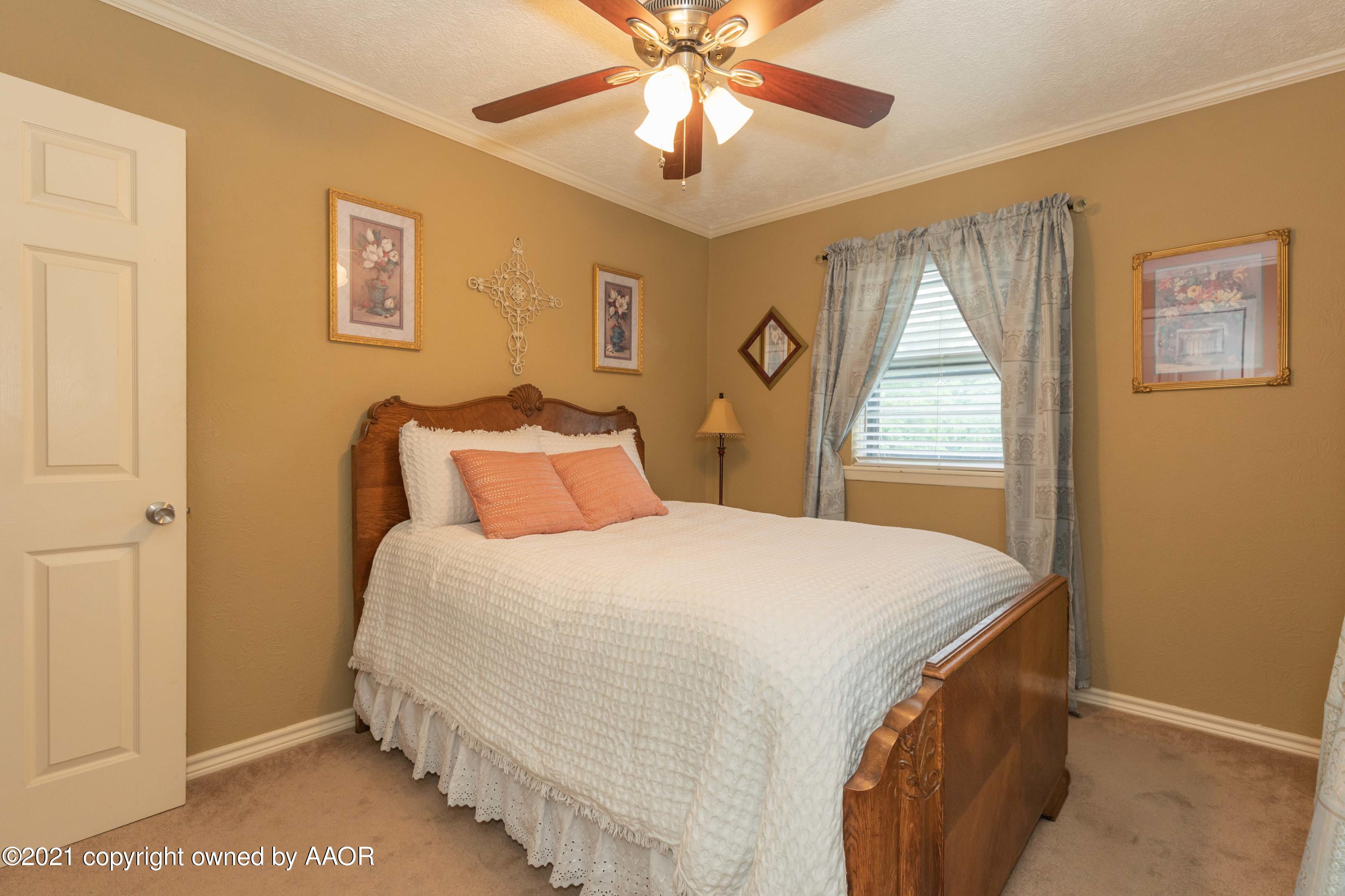 4707 Journey Street Amarillo, TX 79110 - Photo 50 of 65 a bedroom with a bed and a window