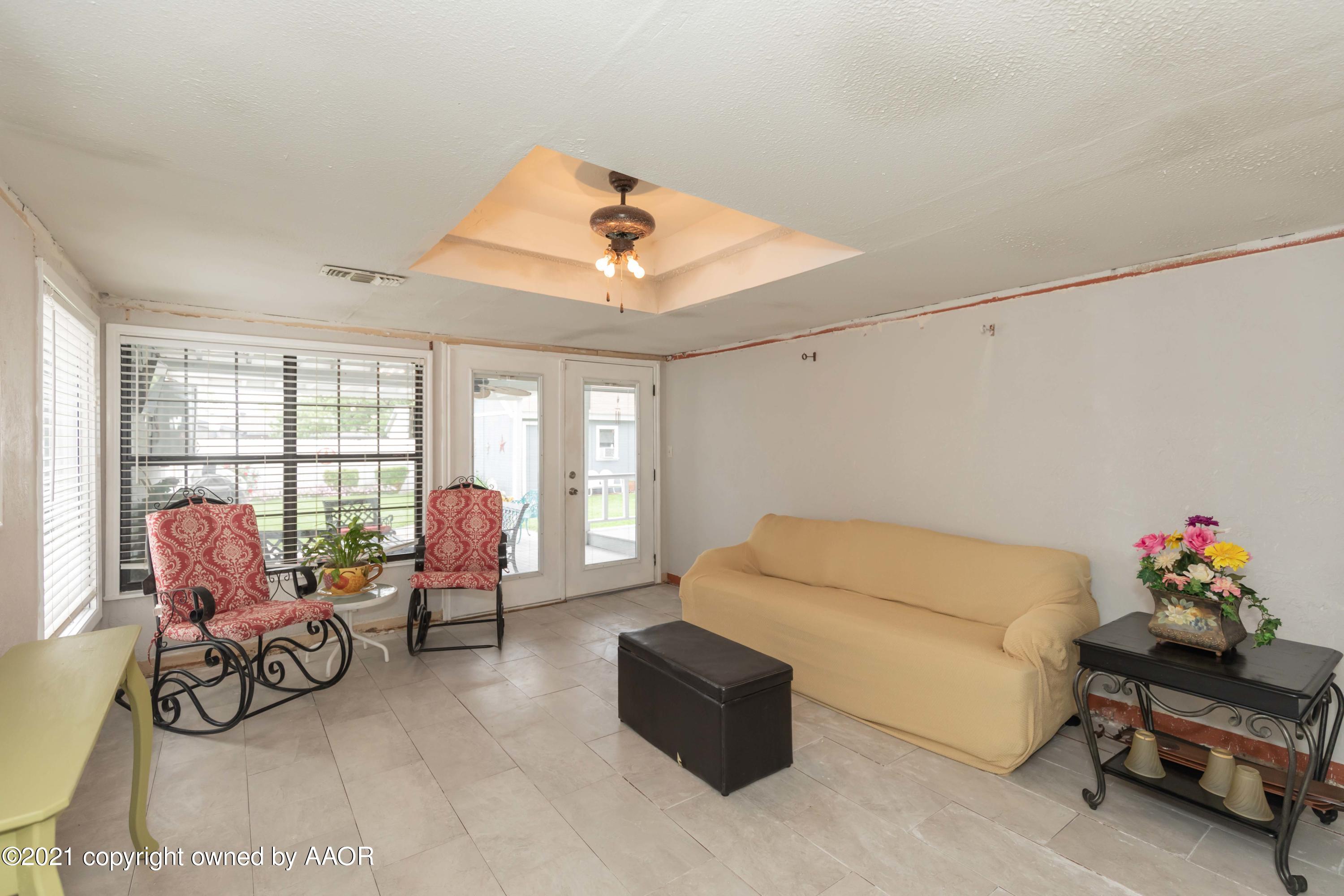 4707 Journey Street Amarillo, TX 79110 - Photo 60 of 65 a living room with furniture and a window