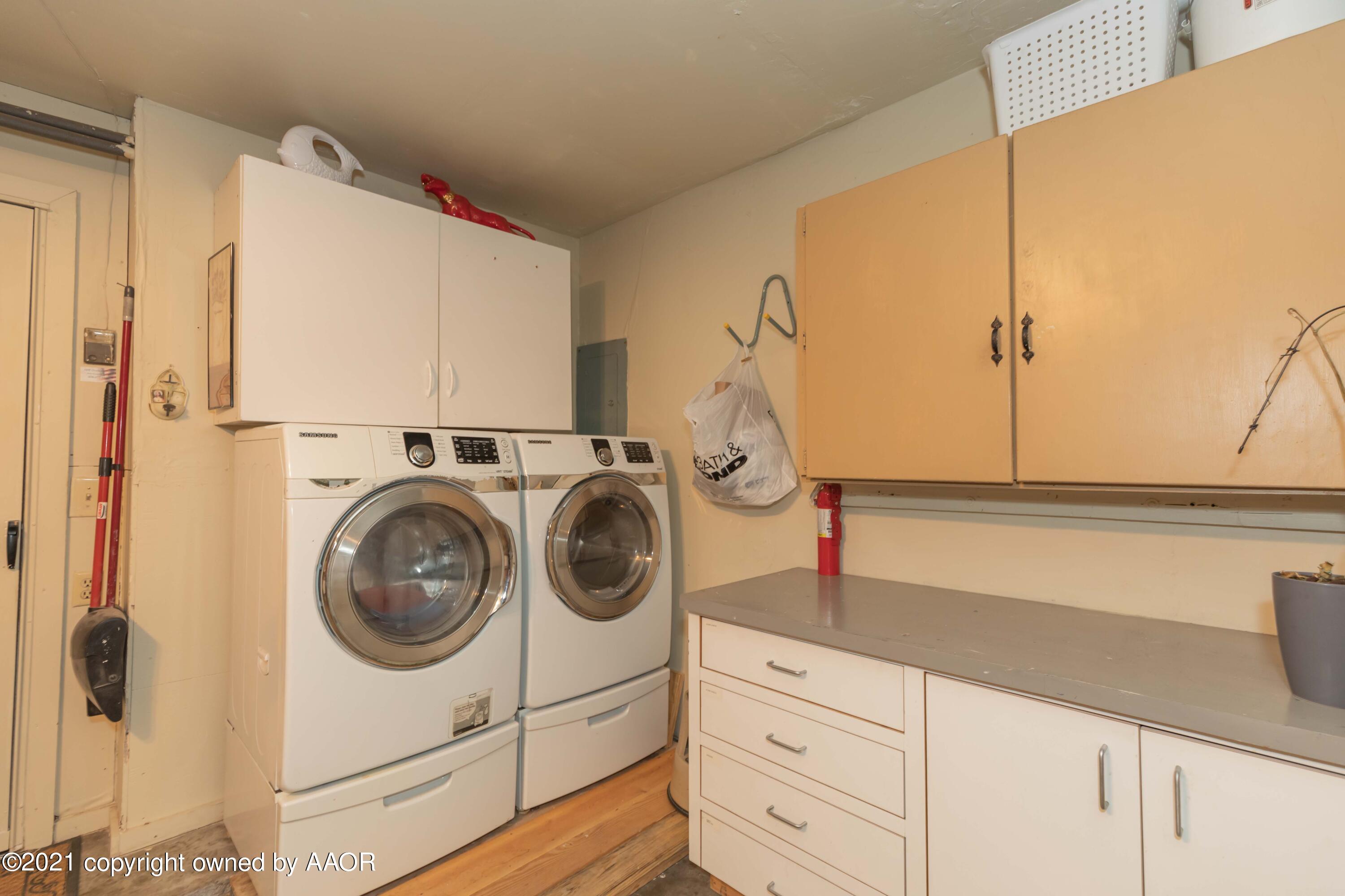 4707 Journey Street Amarillo, TX 79110 - Photo 62 of 65 a utility room with dryer and washer
