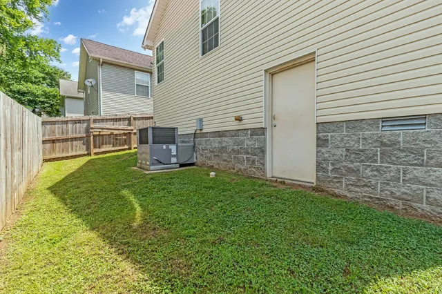 a view of a backyard with a garden