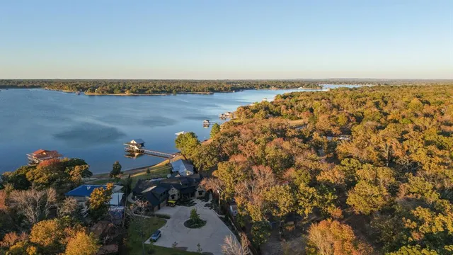 a backyard of a house with lots of trees