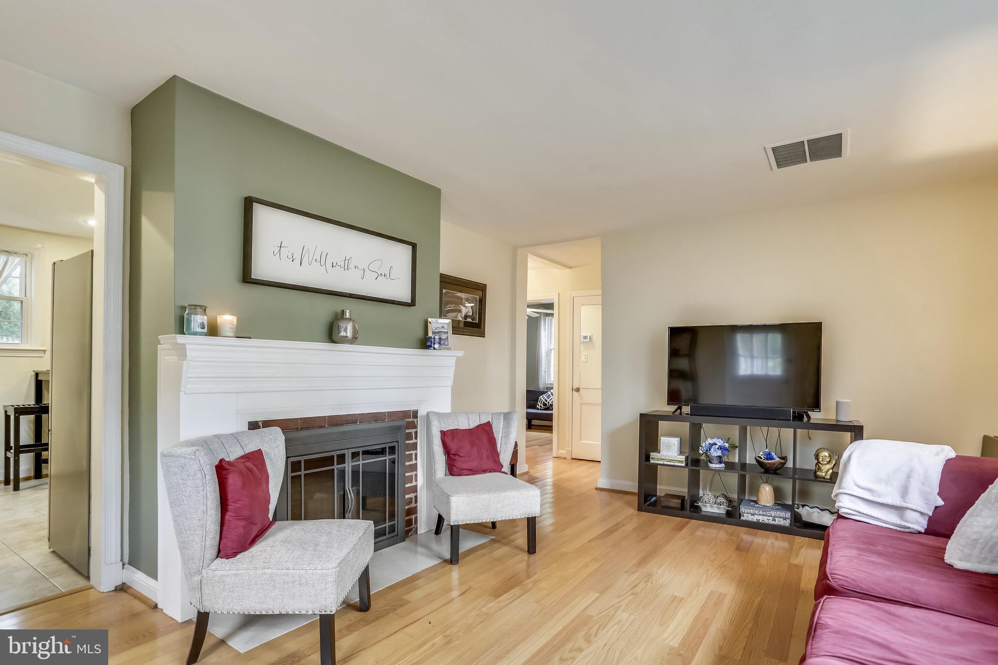 3102 Dawson Avenue Silver Spring, MD 20902 - Photo 5 of 37 Living Room with Wood Burning Fireplace