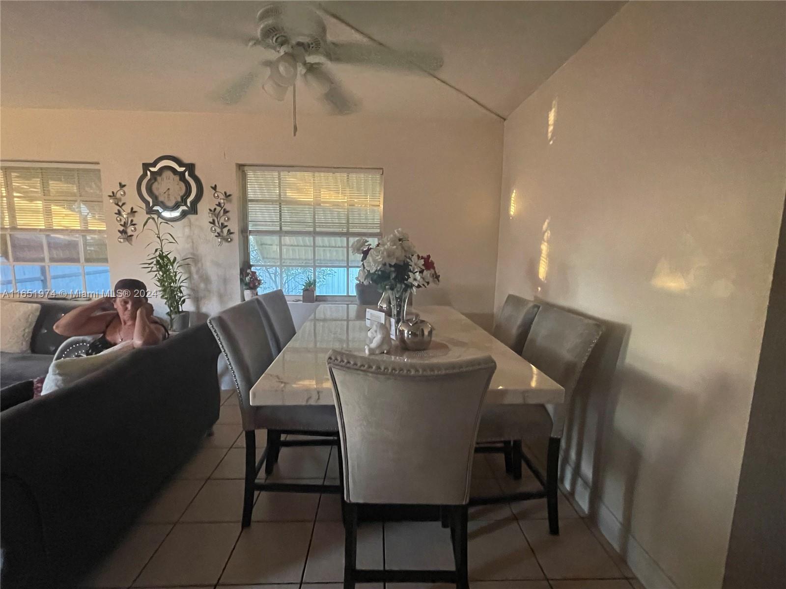 29361 Maine Road Homestead, FL 33033 - Photo 5 of 12 a dining room with furniture and window