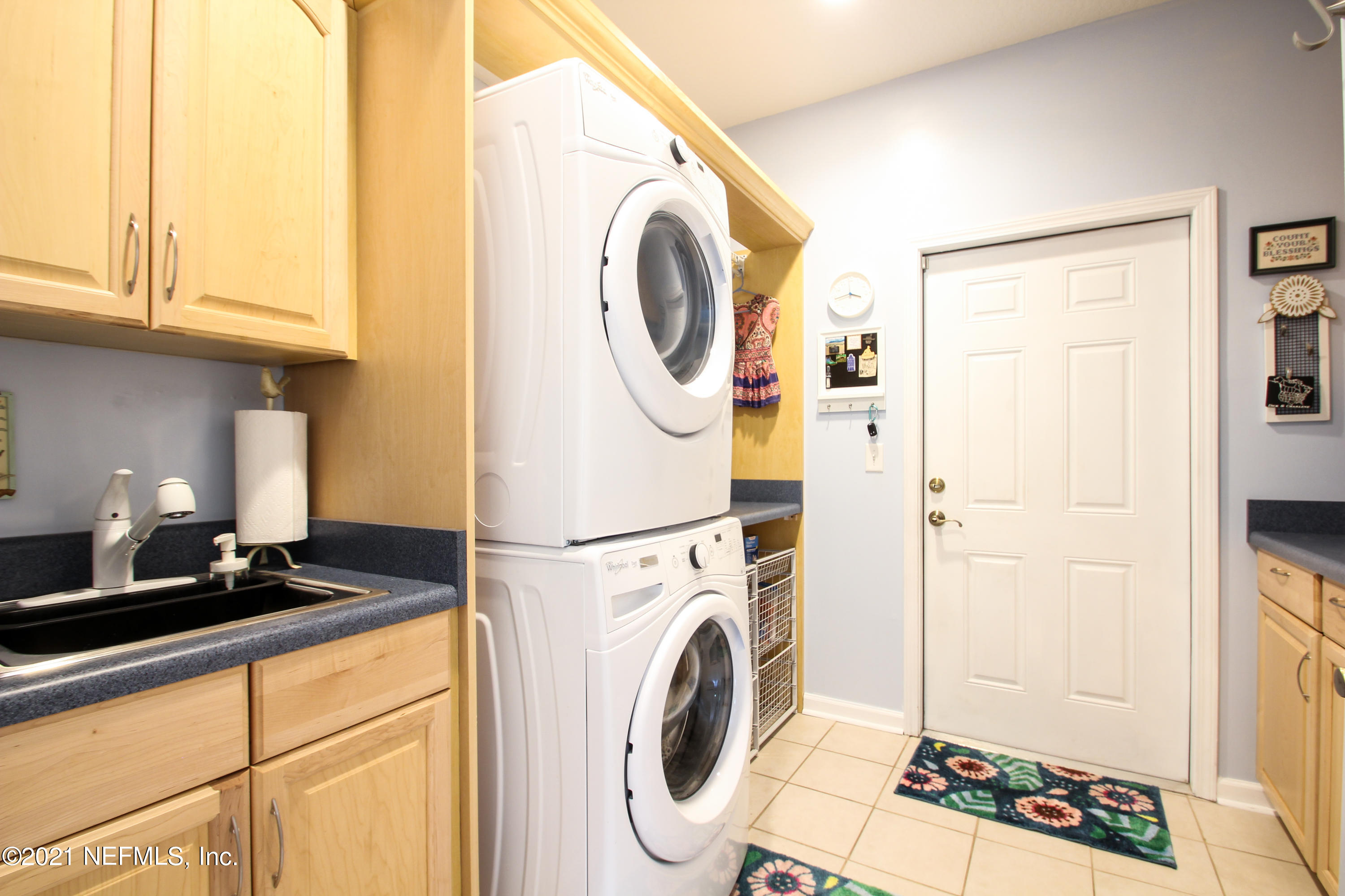 1386 Long Bay Road Middleburg, FL 32068 - Photo 31 of 40 a utility room with dryer and washer