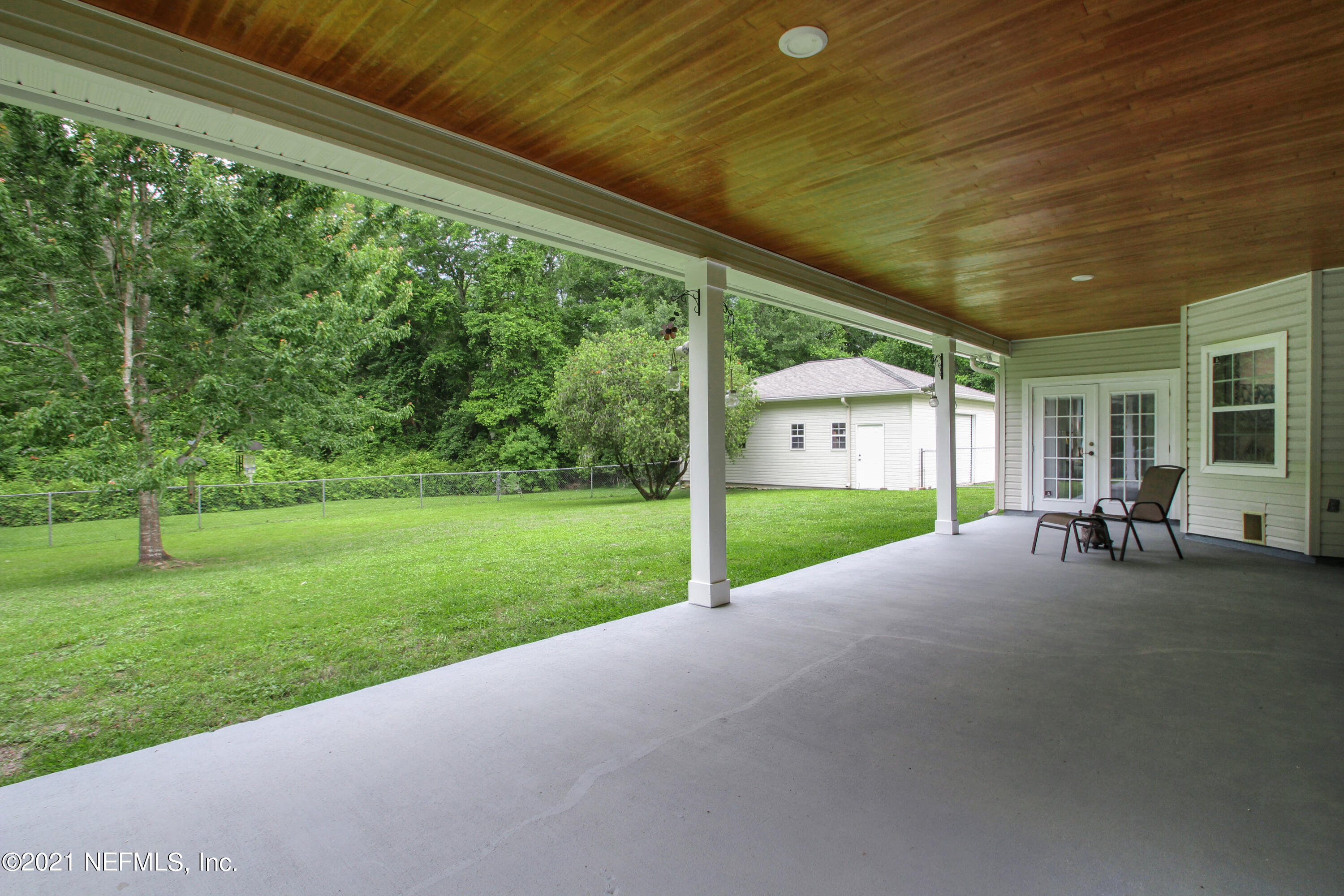 1386 Long Bay Road Middleburg, FL 32068 - Photo 34 of 40 a view of a house with backyard and porch