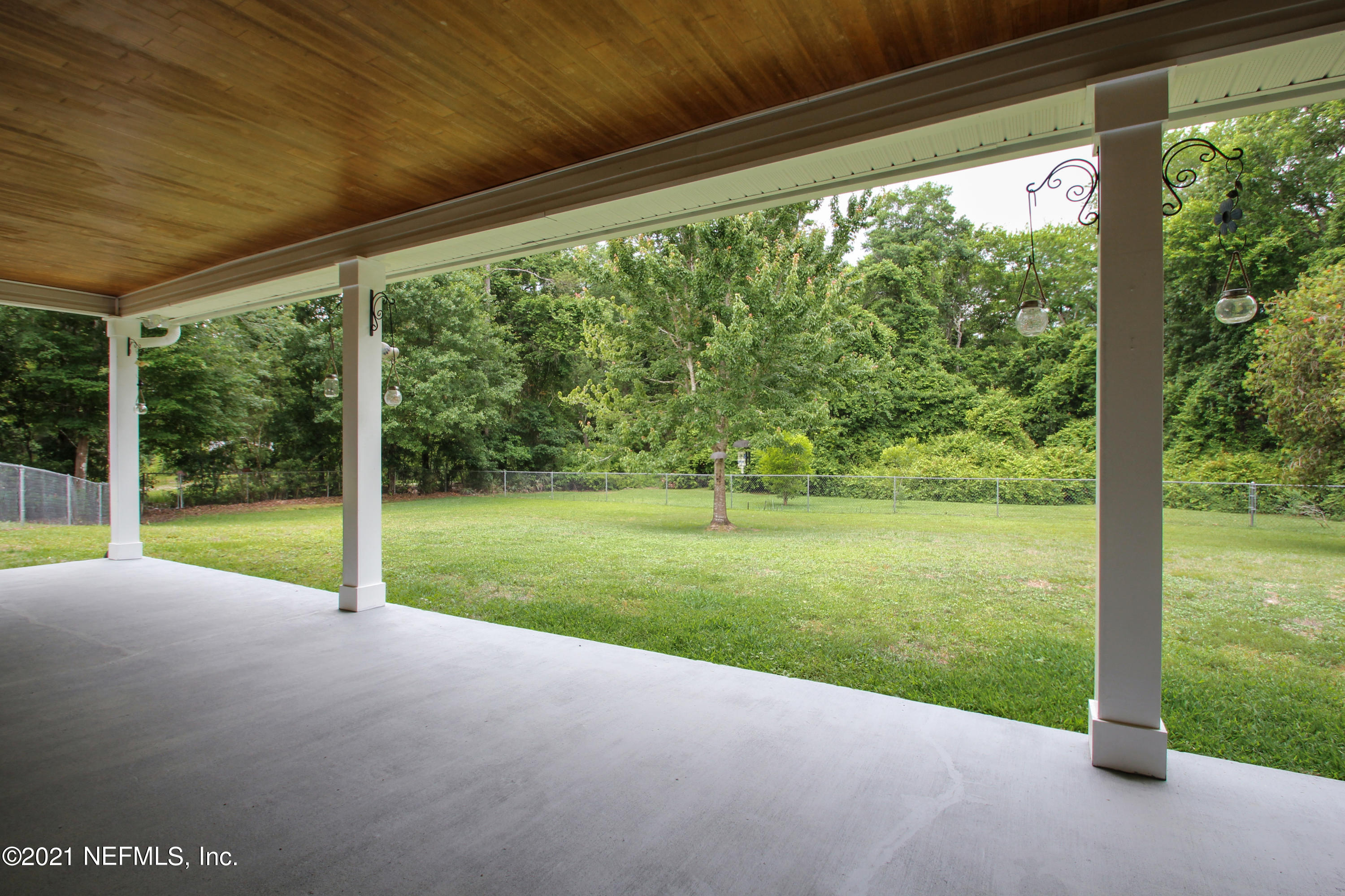 1386 Long Bay Road Middleburg, FL 32068 - Photo 35 of 40 a view of a house with backyard and a backyard