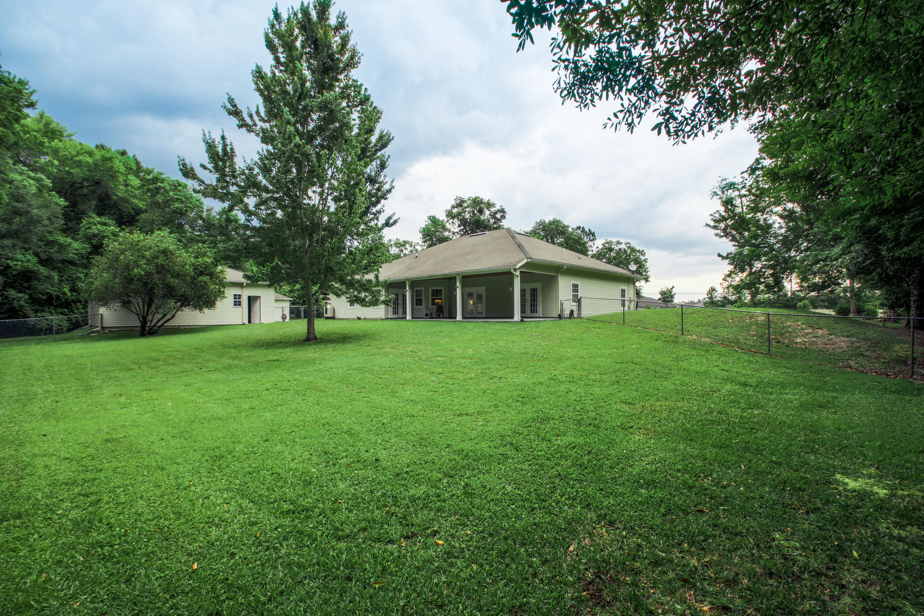 1386 Long Bay Road Middleburg, FL 32068 - Photo 36 of 40 a view of house with yard and green space