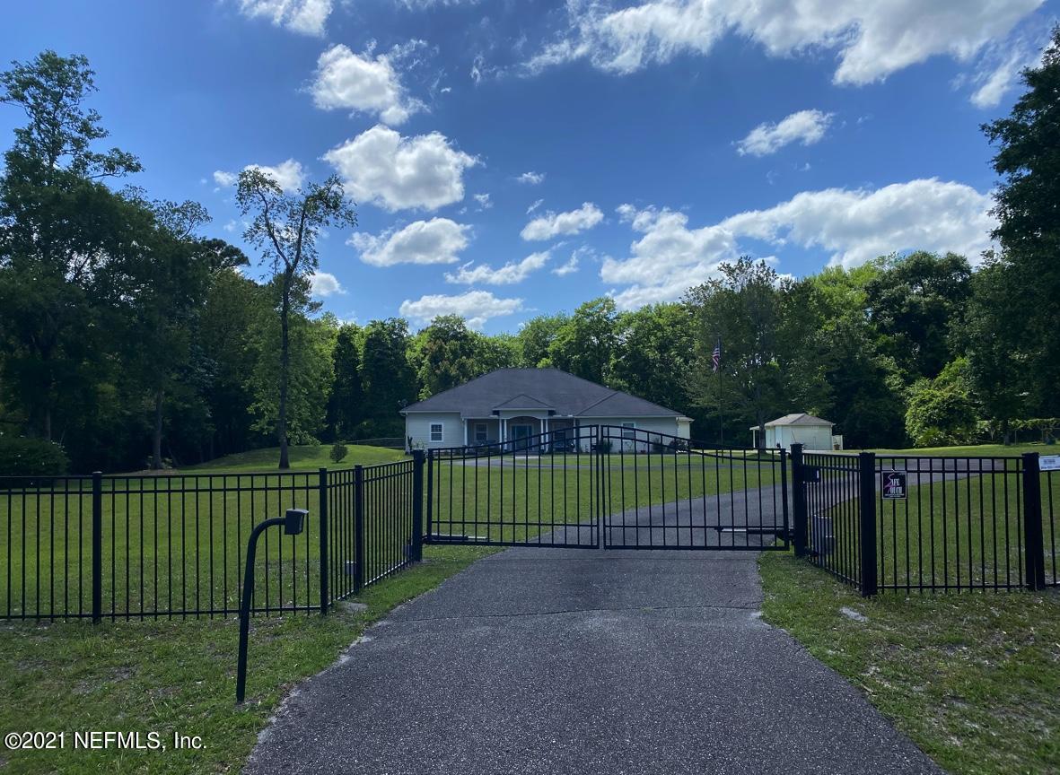 1386 Long Bay Road Middleburg, FL 32068 - Photo 39 of 40 a view of a park with a wooden fence