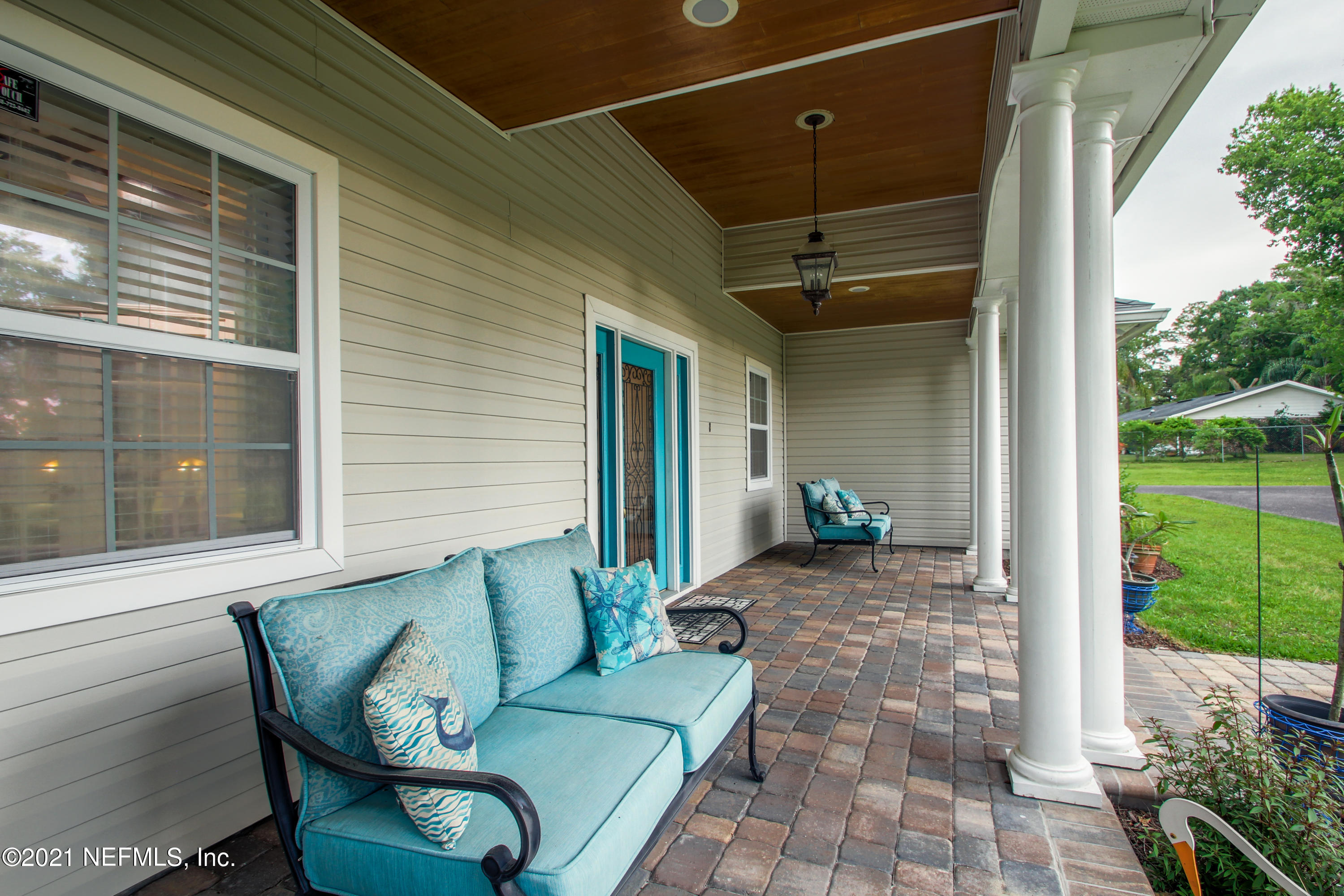 1386 Long Bay Road Middleburg, FL 32068 - Photo 6 of 40 a view of a porch with furniture and yard