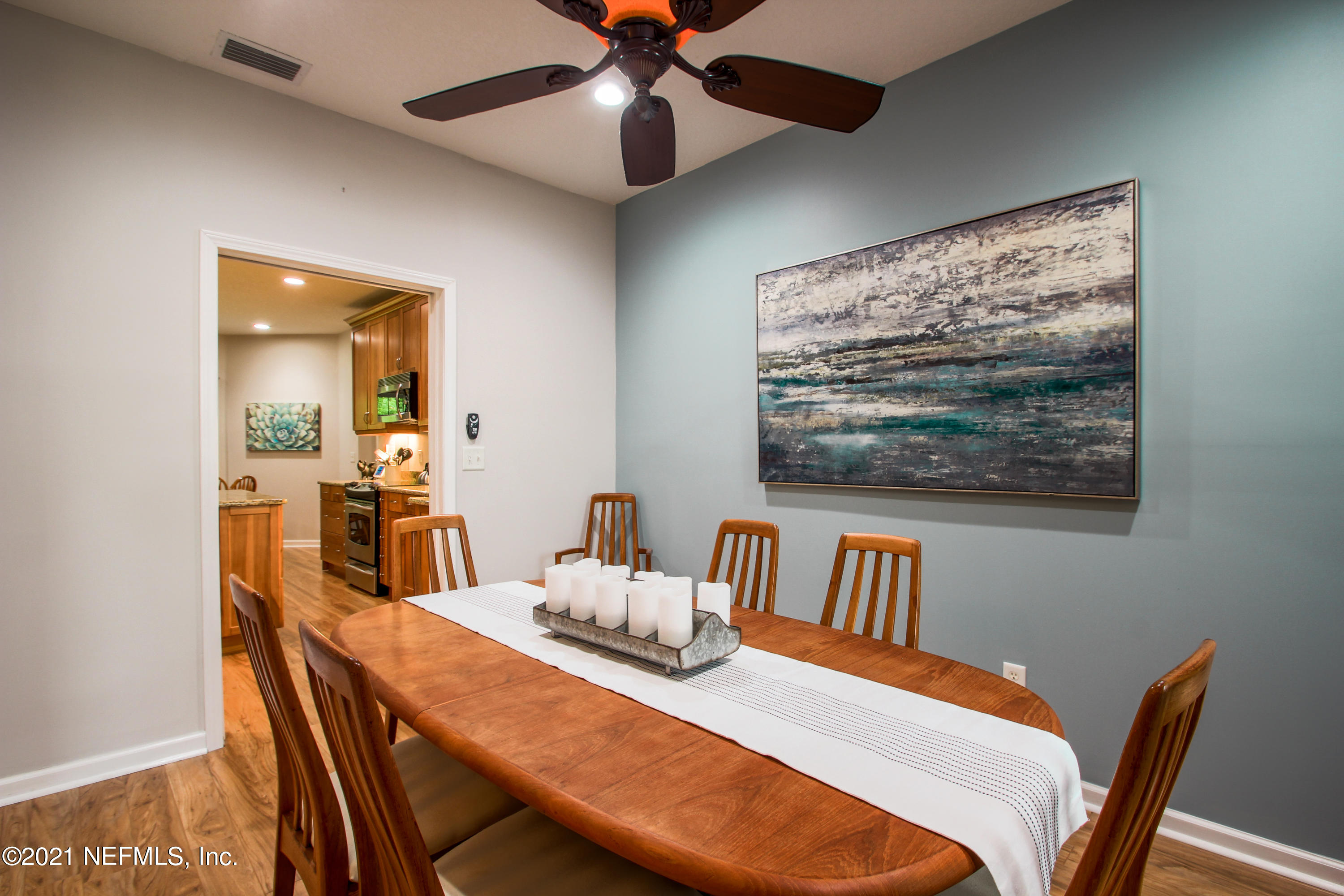 1386 Long Bay Road Middleburg, FL 32068 - Photo 9 of 40 a dining room with furniture and window