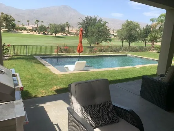 a view of a lake with a deck