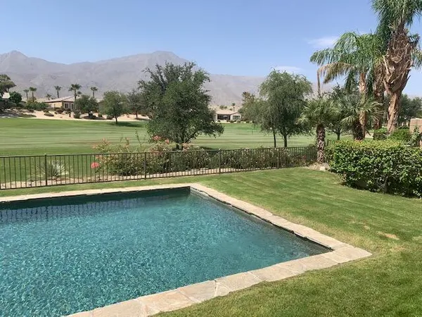 a view of a lake with a big yard