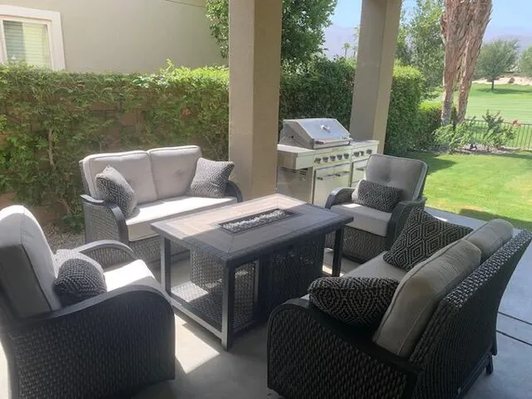 a outdoor living space with furniture and garden view