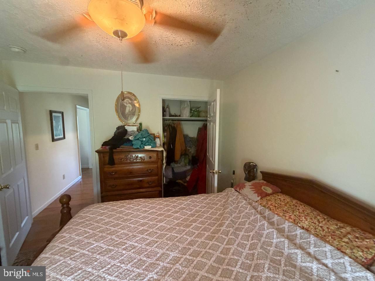 333 East Bailey Road Lewisburg, WV 24901 - Photo 39 of 57 Cozy bedroom with warm lighting.