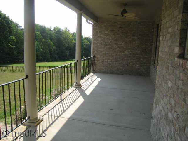 4908 Robdot Drive Oak Ridge, NC 27310 - Photo 8 of 9 Other. Covered Back Porch