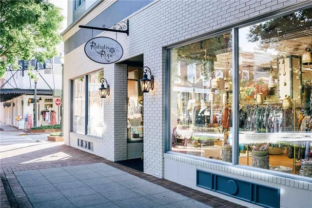 a view of a two chairs in the park
