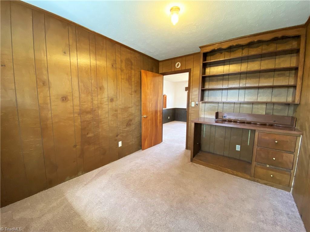 912 Rierson Road Madison, NC 27025 - Photo 16 of 37 Office/study with built in shelving and desk