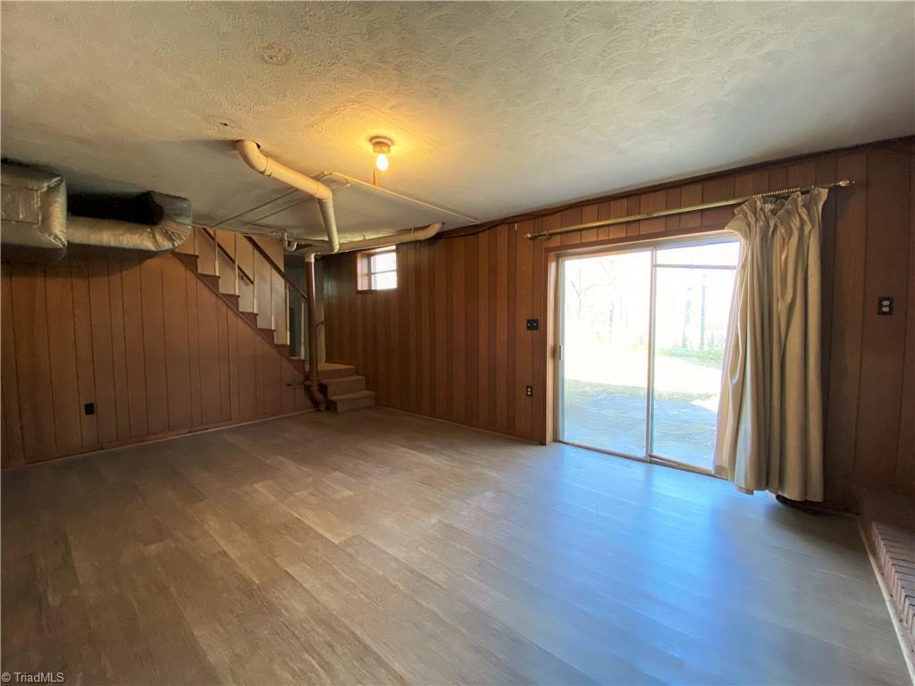 912 Rierson Road Madison, NC 27025 - Photo 18 of 37 Basement and door to patio