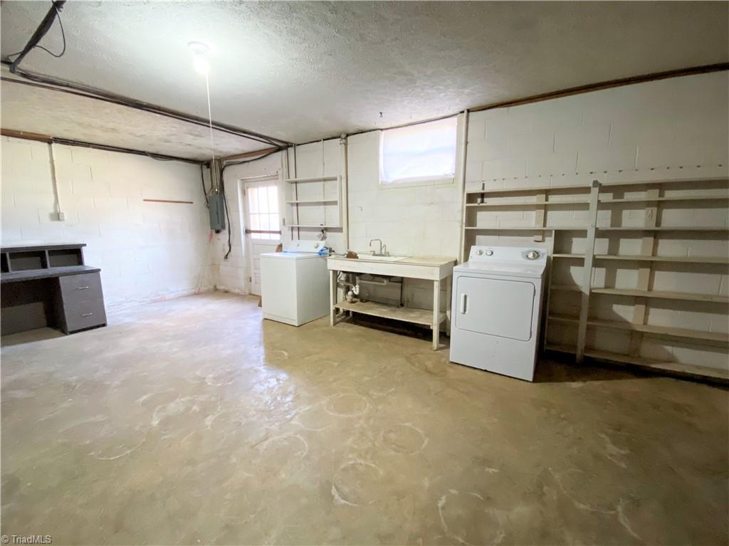 912 Rierson Road Madison, NC 27025 - Photo 22 of 37 Laundry area in walkout basement